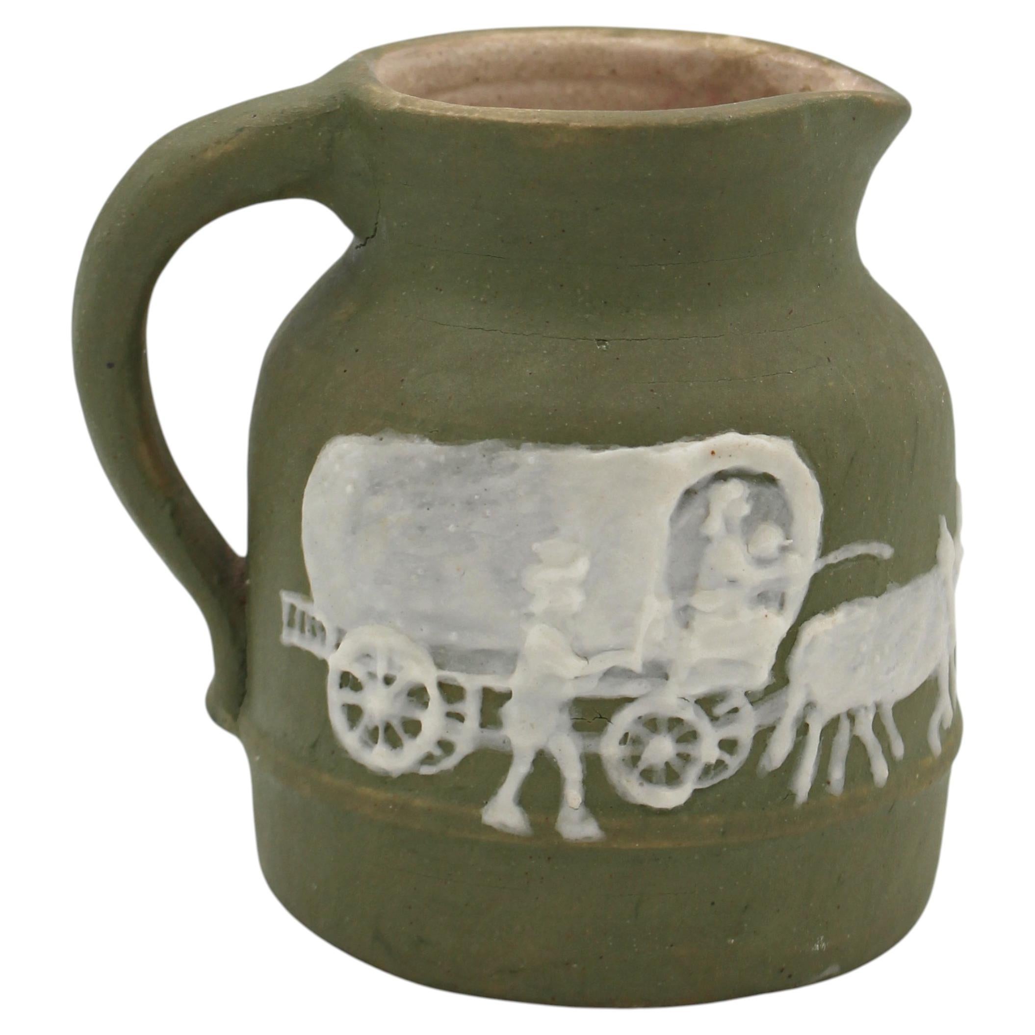 WCI-9305z: 1960 NC Cameo Decorated Small Pottery Pitcher by Walter Stephen